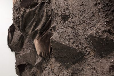 Detail of an artificial rocky terrain covered soil