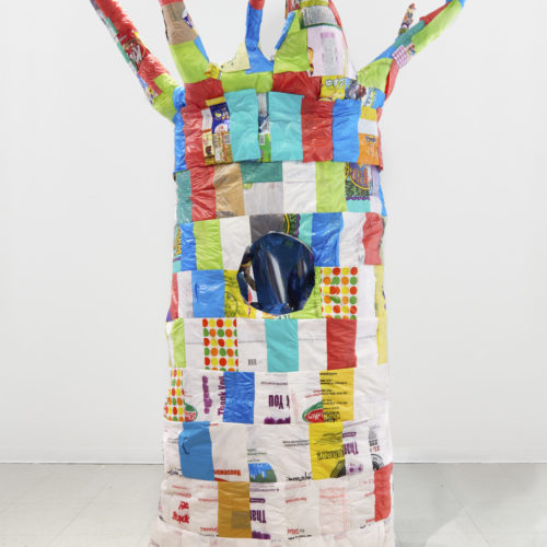Artwork by Sophy Chang. BFA Fine Arts, 2019. Mixed media sculpture shaped like a tree using multiple colored pieces of plastic.