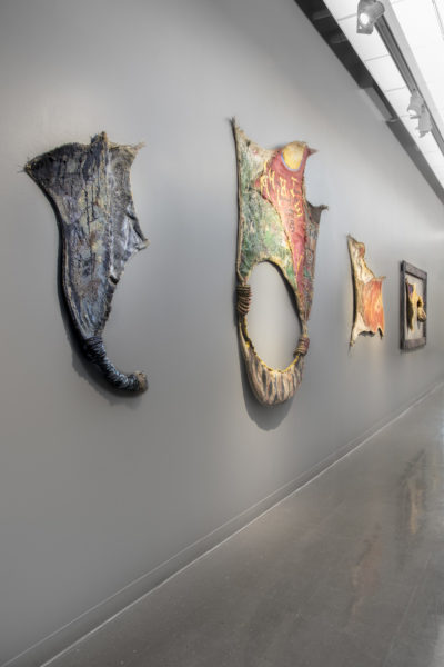 Artwork by Vieno James. BFA Fine Arts, 2019. Multiple animal painted leather hides stretched over thin wooden frames. 