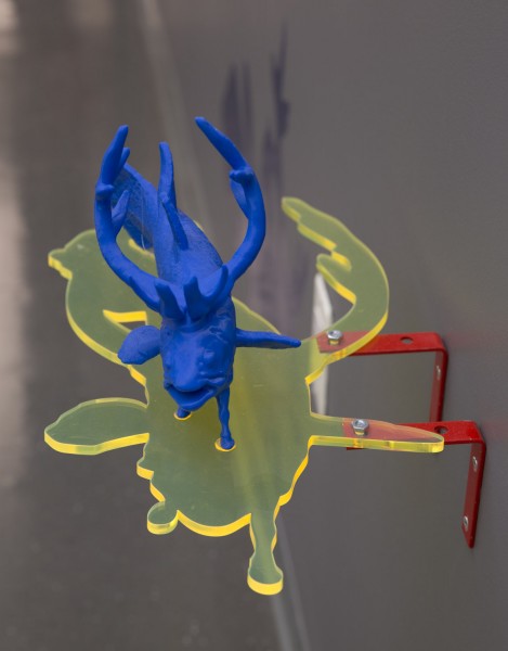 3D printed model in blue color in the shape of a fish with feet and deer horns.