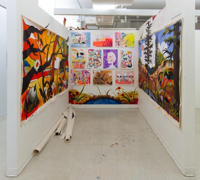 Installation View of Daniel Austin Romanaux's studio with a series of colorful graphic paintings.
