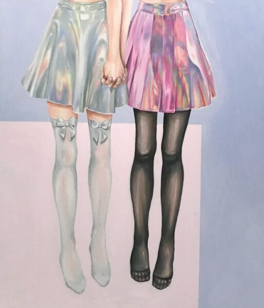 Two holding-hands characters wearing a iridescent skirt and white and blackstockings