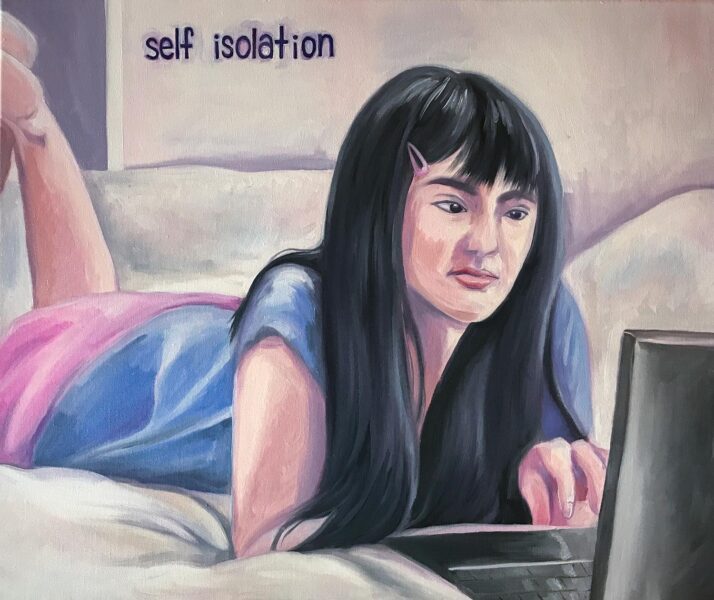 Potrait of a person laying in bed while looking at a laptop screen