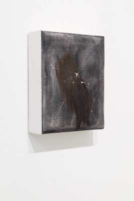 A painting by Cameron Richie. The painting is dark with an faded abstract shape in the ccenter. There are thin white lines across the painting that mimic a cracked window.