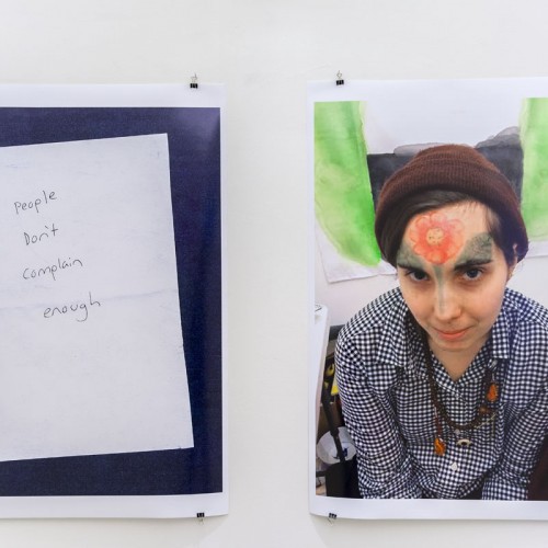 Two prints on paper: a hand-written message on the left side and a portrait of a girl with a flower painted on her face on the right side by Cassidy Toner.