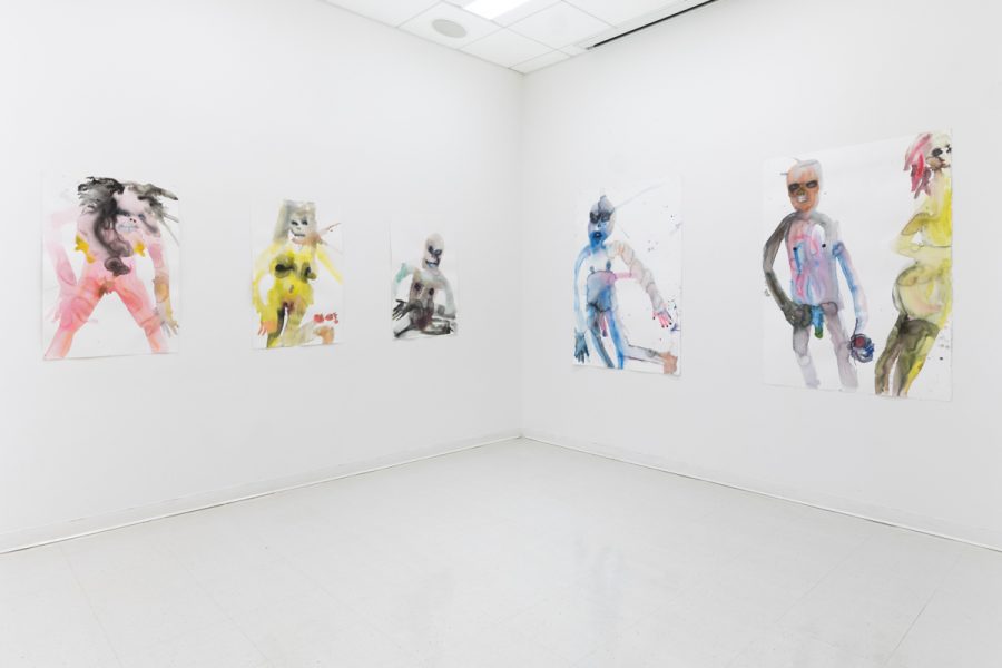 Installation view of artwork by Chris Thixton. Multiple watercolor paintings of abstract figures using multiple colors.