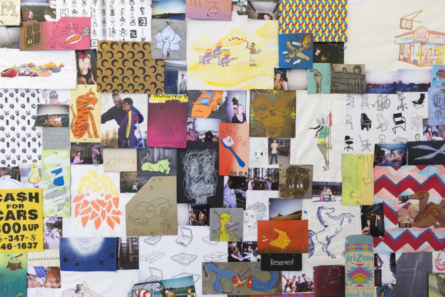 Collage on a wall, very colorful and maximalist.