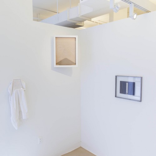 Installation view of 3 artworks in different dimensions mounted on white wall by Daniel Fairbanks