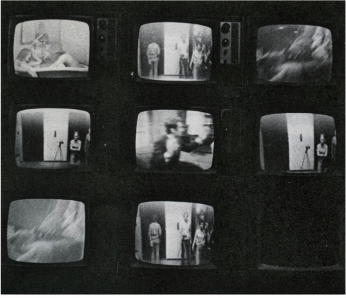 Six vintage TV screens all in black and white depicting various scenes with people in it, the screen on the bottom right is all black