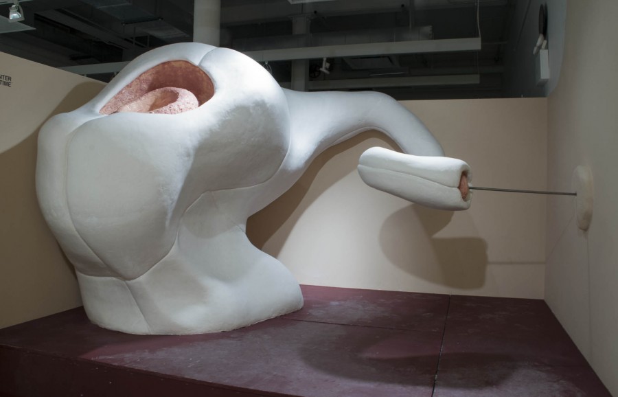 Sculpture made of silicon and foam of an organic shape object placed on a table.