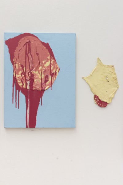 Painting of a pale red object with dark red draining off and beside a piece of yellow material 