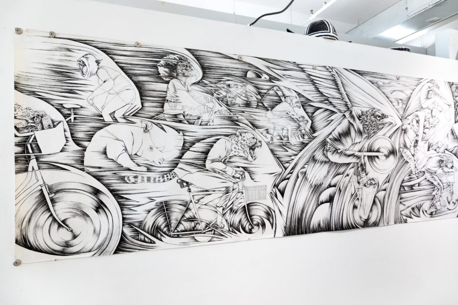 Artwork by Julio Cesar Candelario. Black and white mural with multiple figures and objects.