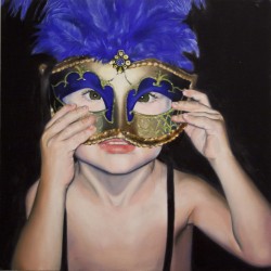 A child portrait with a golden carnival mask with blue feather and blue accents