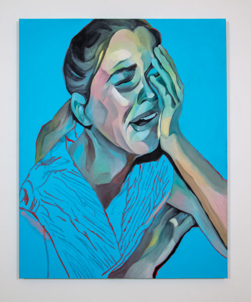 A young woman is painted screaming and weeping. Her head is tilted toward the viewer’s lower right side. Her left hand is pushing against the left side of her face. Her eyes are closed and her eyebrows are knitted together. Her mouth is open. Her hair is in a low ponytail. The background is a flat medium blue.