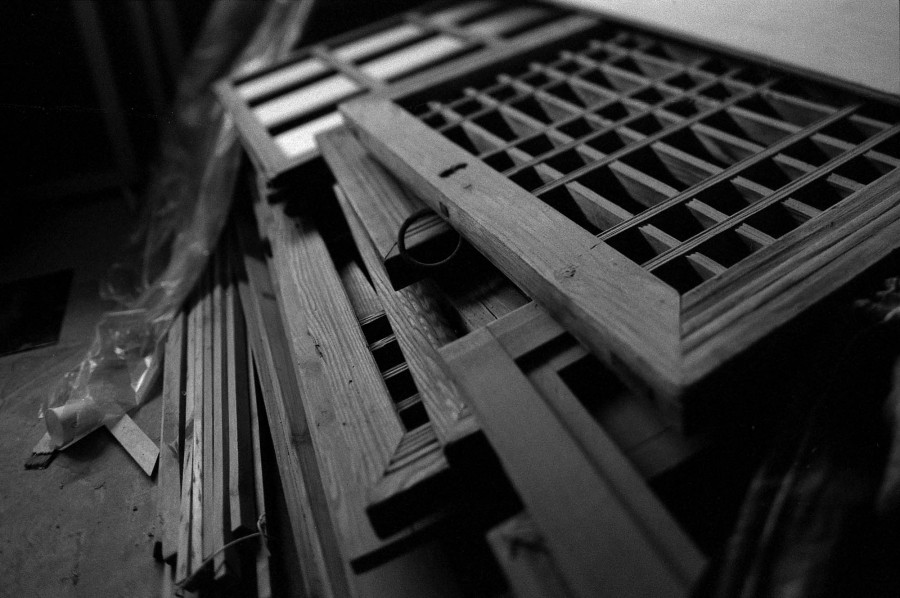 Close look of a pile of wooden window shutters