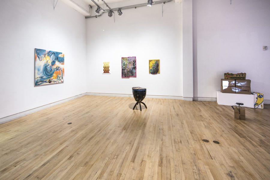 Install image of a gallery with four paintings on the wall and a sculpture on the floor