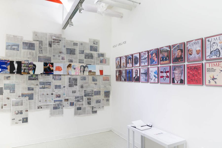 Installation view of pages of newspapers attached to a wall and at the middle of the wall is made a horizontal line with vivid colored paintings, and o the next wall is installed and grid of twenty color Time magazine covers with different public figures