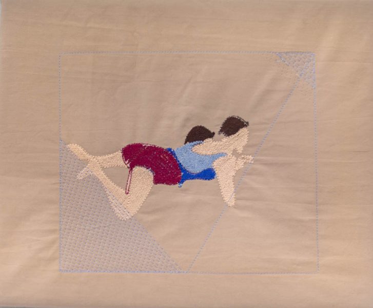 The embroidery represents a man swimming in a pool, dressed in a blue shirt and red pants
