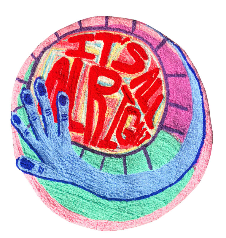 Yarn and fabric two-dimensional form of text and swirling arm. Text says in red yarn, "It's all alright." Background of blue and purple yarn swirl around the text, there is a depiction of a hand surrounding the text.