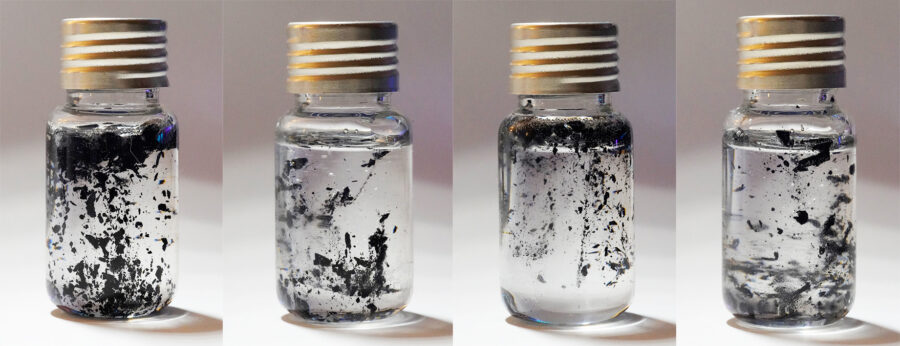 Photo stills of a glass vial, Pigments are floating and swirling inside. From the artist: This series is about keeping nature in a tiny container. The nature patterns move randomly in the tube at first, but they will be permanent as the resin cooled down. I used the artificial material to stimulate capturing the natural elements and keep them with me. Nature is usually unpredictable and untouchable, but it is very interesting to make an artificial nature which can be handled by one hand.