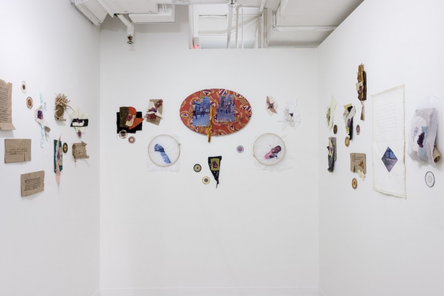 Installation view of embroidered and many other materials artworks.