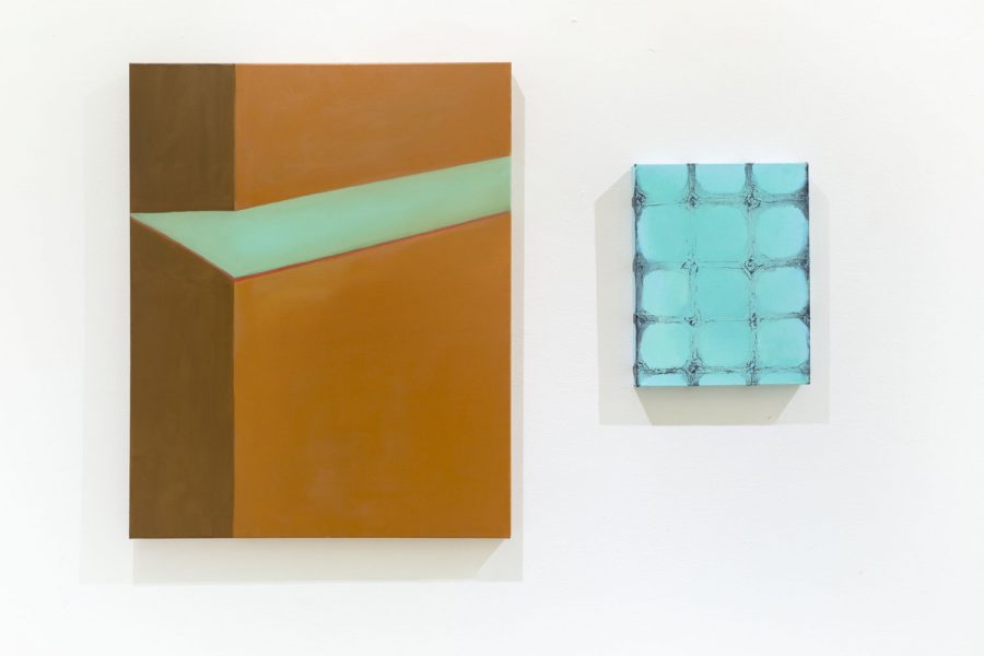 Two paintings, the one on the left is rectangular and looks like a picture of a tan and brown ledge with a teal accent to the top of the ledge, and to the right is a smaller rectangular painting that is blue and light blue that resembles a light grid