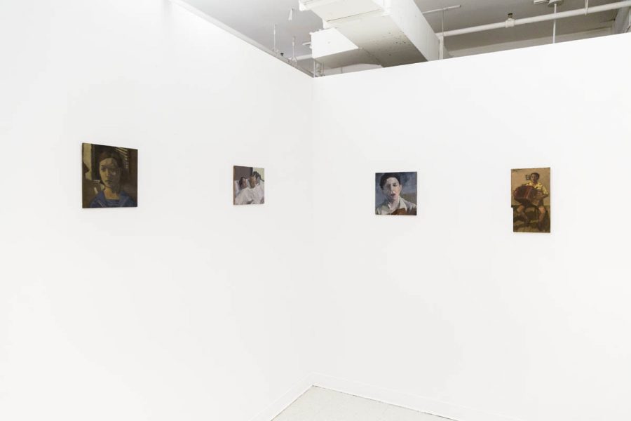 Exhibition view of four paintings arranges as two on a wall and two on the other wall
