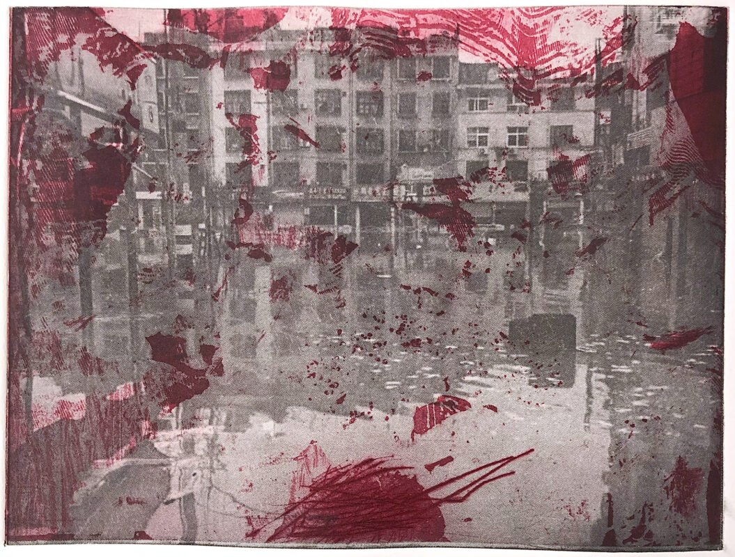 Photo - etching showing a black and white flooded city landscape with scarlet abstract textures