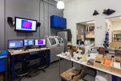 An interior view of the CNC Digital Sculpture lab. In the foreground are various works by students in Digital Sculpture. Also visible are two rapid-prototyping machines.