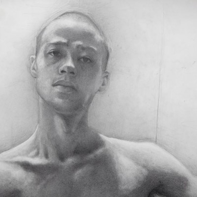 A graphite (pencil) selfportrait drawing by one Fine Art Student. It is rendered in a realistic style and the artist is looking straight at the viewer.