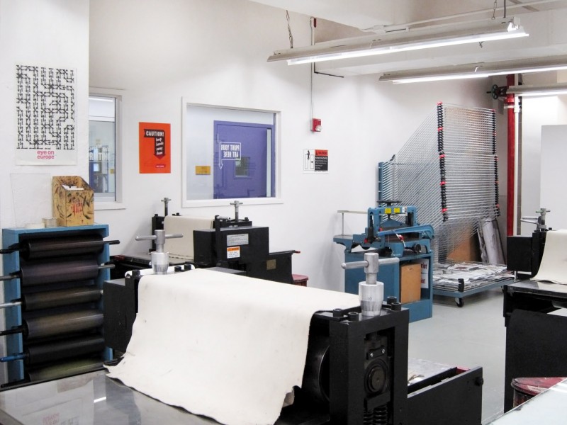 Overview of the print shop with a large-scale printer.