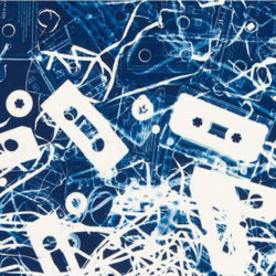 A photogram artwork by Christian Marclay depicting white flat audio tapes on a blue background